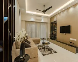 Stunning living room by interior decorators in Mangalore featuring stylish décor modern furniture and a refined design.